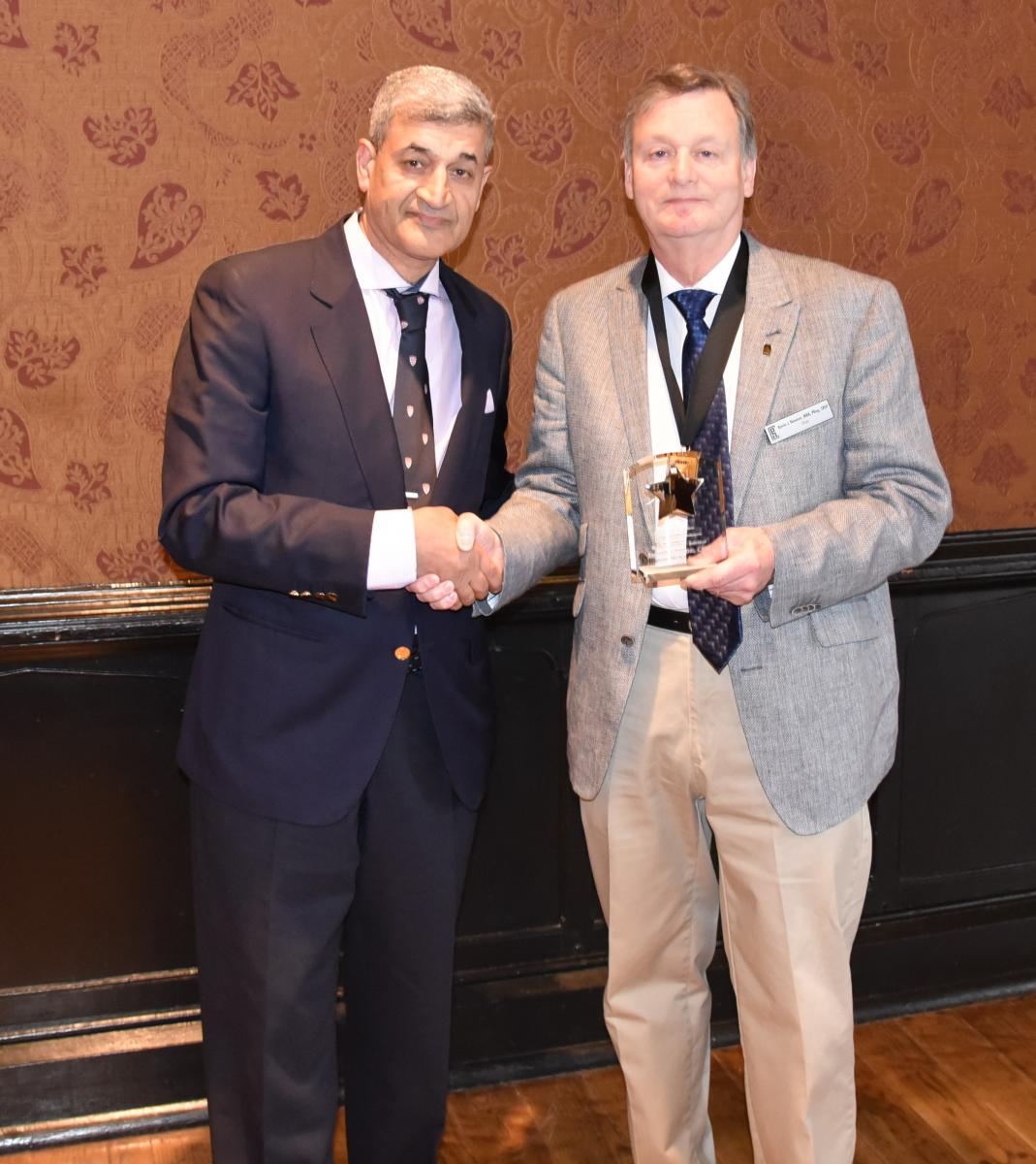 Ebrahim Noroozi, 2018 BCRSP Recognition Award Winner, and Kevin Dawson, BCRSP Chair.