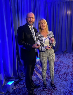 Paul Belair presents Robin Angel outgoing Governors Plaque